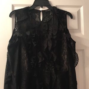 Black lace BCBGmaxazria cold shoulder blouse.